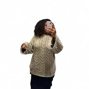 Oversized cable knit sweater with bell sleeves
